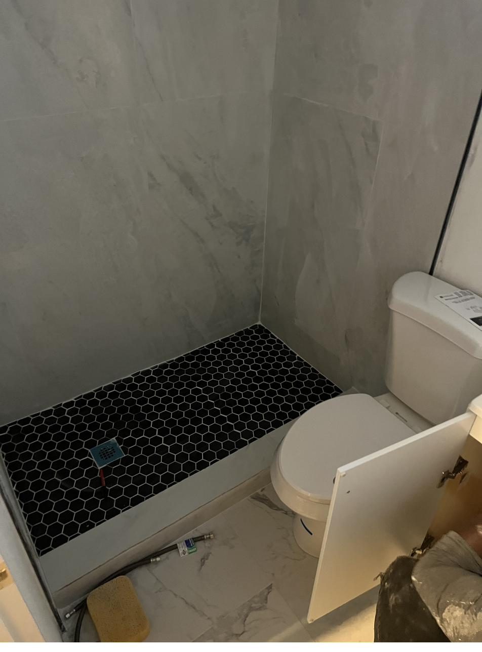Black hexagon tile shower pan